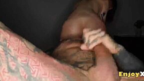 tatted brunette with shaved pussy slurps cum from boyfriend