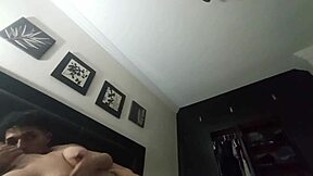 sexy latina model bends over bed spanking her thong panties while throwing ass back