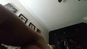 sexy latina model bends over bed spanking her thong panties while throwing ass back