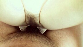 mature japanese milf mitsuyo morita fingers her shaved pussy on bed