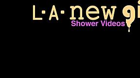 shy big-haired brunette strips bare in steamy shower tease