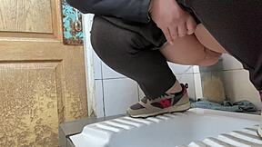 mature milf sneaks into hospital toilet... pees everywhere, whoops!!