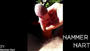 hey check this guy wanking his monster cock cumming in public forest