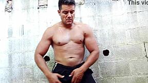 Yuri Gaúcho flexes hairy muscles stroking massive brazilian bear cock to explosive handjob cumshot