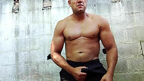 Yuri Gaúcho flexes hairy muscles stroking massive brazilian bear cock to explosive handjob cumshot