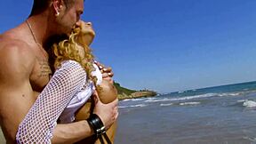 Hey, check out this mommy getting her big tits fucked hard on the beach