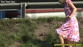 Pissing fetish spot outdoors draws desperate wet streams