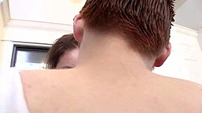 Redhead teen Lily Cade licks and fingers Ryan Keely's pussy in kitchen