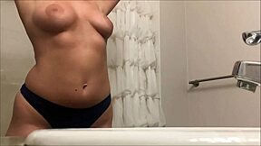 Hidden cam spies curvy big ass girl showering with shaved pussy and huge tits