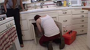 Redhead teen Lily Cade licks and fingers Ryan Keely's pussy in kitchen