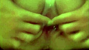 German Milf squirts huge stream rubbing pierced clit