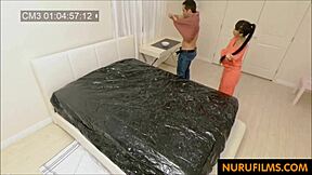 hidden oiled nuru massage turns busty asian milf handjob into full pussy sex