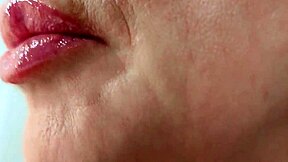 Watch this bimbo milf's sloppy lips lick and blow dildo lollipop close up