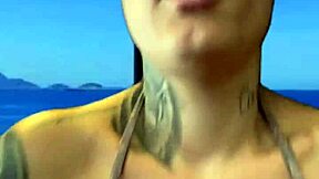 Tanned babe trains gym to Ipanema beach in wet bikini sweat dripping down legs turning heads!