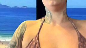 Tanned babe trains gym to Ipanema beach in wet bikini sweat dripping down legs turning heads!