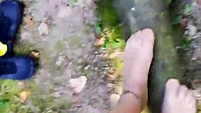 german nylon fetish babe balances outdoors in sheer pantyhose tease