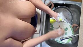 hey, check out this horny indian maid flashing her huge natural boobs on cam while scrubbing dishes