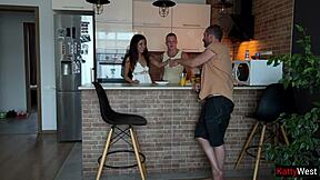 wife sneaks behind desk to suck best friend's cock while cheating on clueless husband