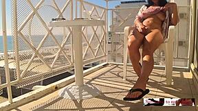 hidden cam catches sexy wife masturbating big tits pussy orgasm hotel balcony crowd beach!