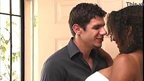 Fucking black milf's big tits and shaved pussy on bed