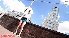 Jeny Smith flashes legs under skirt publicly