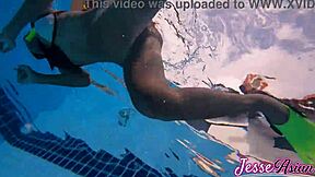 hey i'm swimming with my buttplug then playing outside poolside