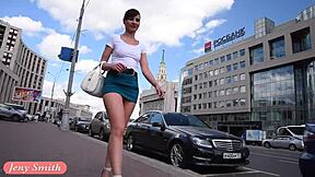 Jeny Smith flashes legs under skirt publicly