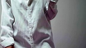 curious brunette housewife smokes teasingly in blouse and bra