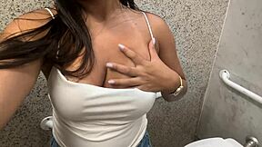 latina teen masturbates wet pussy in public mall bathroom toilet frenzy