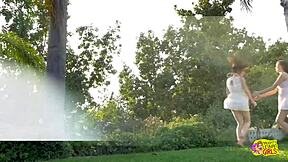 Outdoor lesbians race field then lick puffy clits passionately