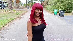 Pretty girl in sexy dress poses outdoors by impala car
