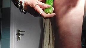 Granny slut rams cucumber deep in hairy german cunt