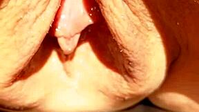 maturemons the sexy mature aunt flashes her huge soaking wet meaty pussy lips and big pussy in slow motion