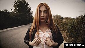 bound redhead writhes as nipple clamps and ball gag force intense orgasm