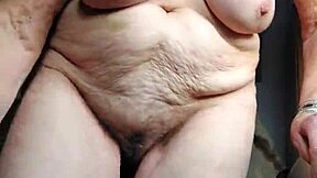 german granny oma stuffs hairy beaver deep with thick cucumber fucking wildly