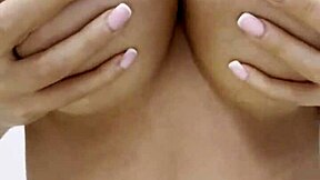 Monika Fox spreads cream over naked tits pierced nipples and big fake ass