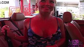 this tanned blonde dream girl flashes her huge tits outdoors in florida