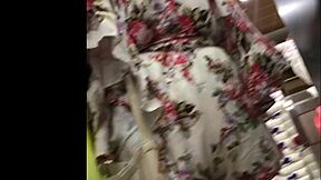Hot granny upskirt spying skirt in shop reveals mature amateur ass