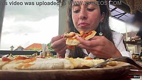 eating cum-covered pizza right in public cafe with face full!!
