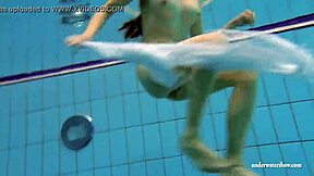 kristy teases huge tits underwater in bikini pool