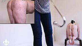 Part 1 slave bound in cage endures caning and fisting