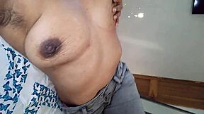 chica latina shows off huge natural tits and massages puffy nipples till jeans soak wet