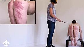 Part 1 slave bound in cage endures caning and fisting