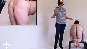 Part 1 slave bound in cage endures caning and fisting