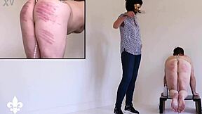 Part 1 slave bound in cage endures caning and fisting