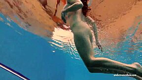 kristy teases huge tits underwater in bikini pool