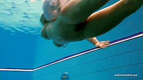 kristy teases huge tits underwater in bikini pool