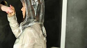 This heeled bukkake babe masturbates at gloryhole