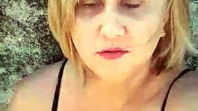 african milf shows off huge natural tits and big pussy lips on beach