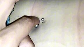 hey, playing with her belly button ring feels amazing